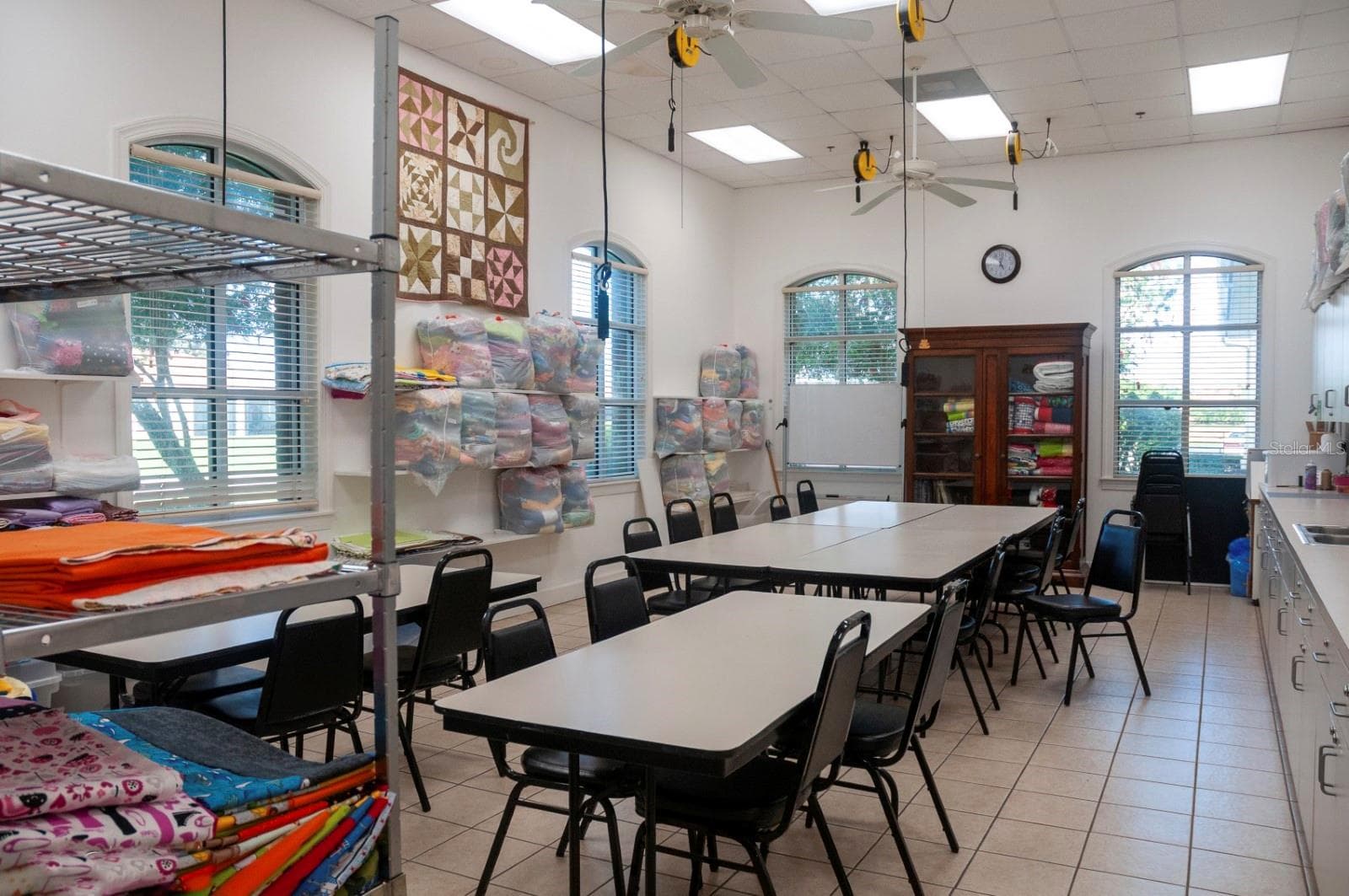 The main clubhouse craft room is home to a wide range of crafting and sewing groups. - 4232 DORNOCH DR, LAKE WALES