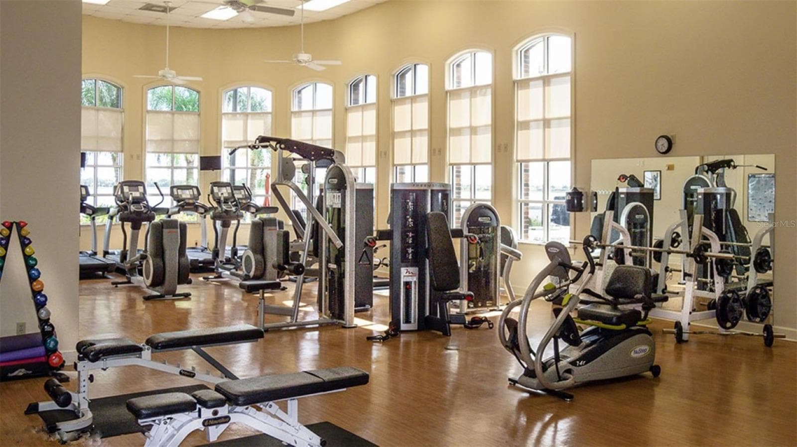 The main clubhouse fitness room has state of the art equipment. - 4232 DORNOCH DR, LAKE WALES