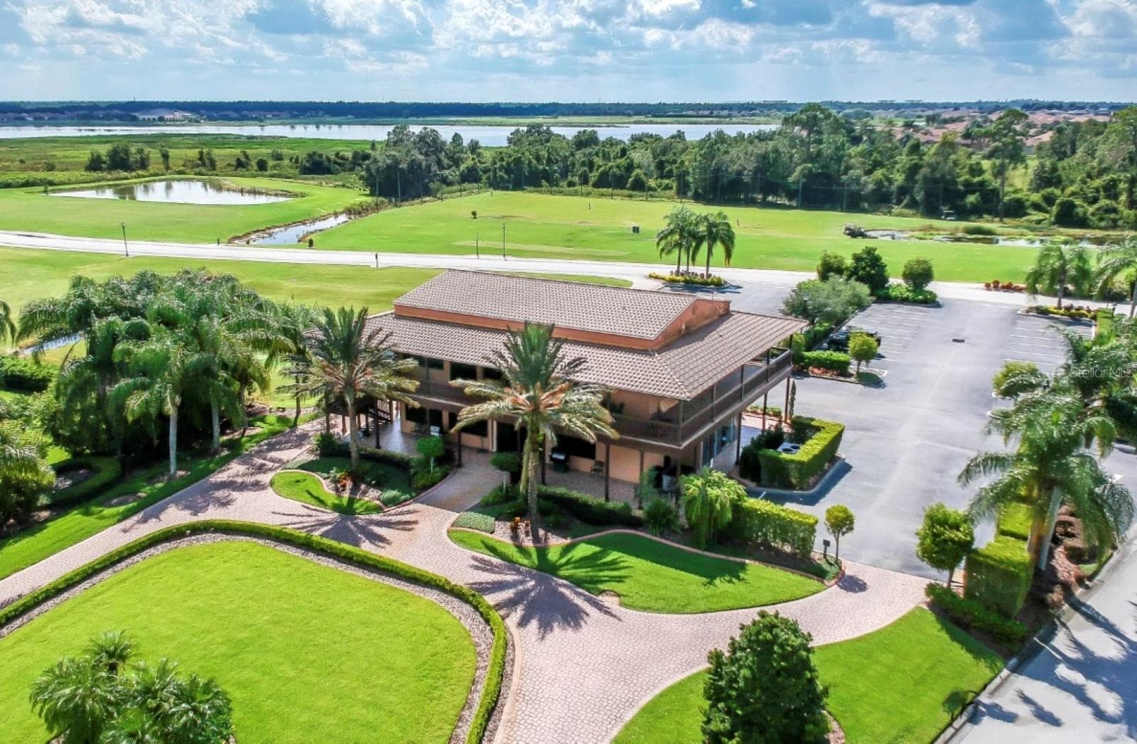 This building is home to the golf pro shop on the lower level and the Eagles Nest Restaurant and Bar on the upper level. - 4232 DORNOCH DR, LAKE WALES