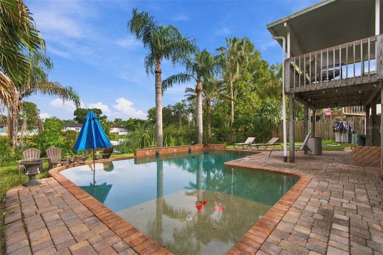 Pool deck w/ view of lake - 915 LYNNLEA LN, TARPON SPRINGS