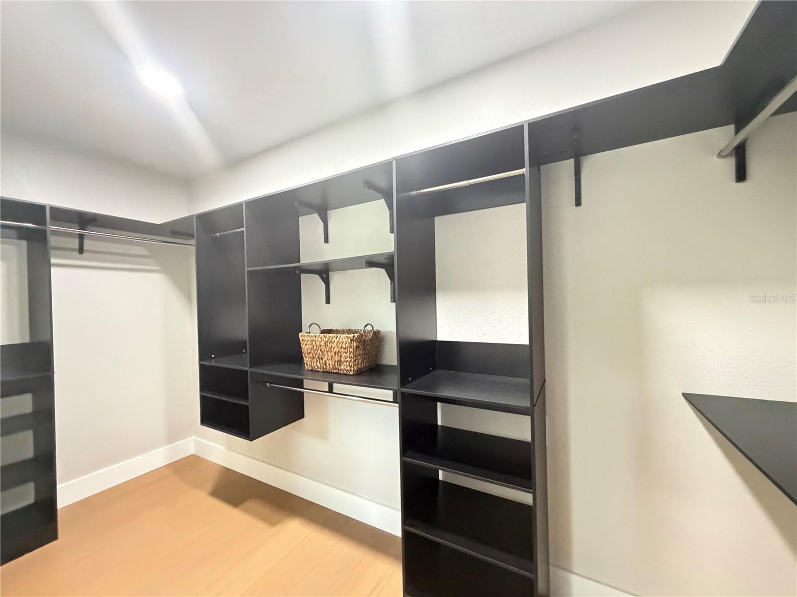 Built-in shelving in Primary Closet - 3915 PORT SIMBOR AVE, ORLANDO