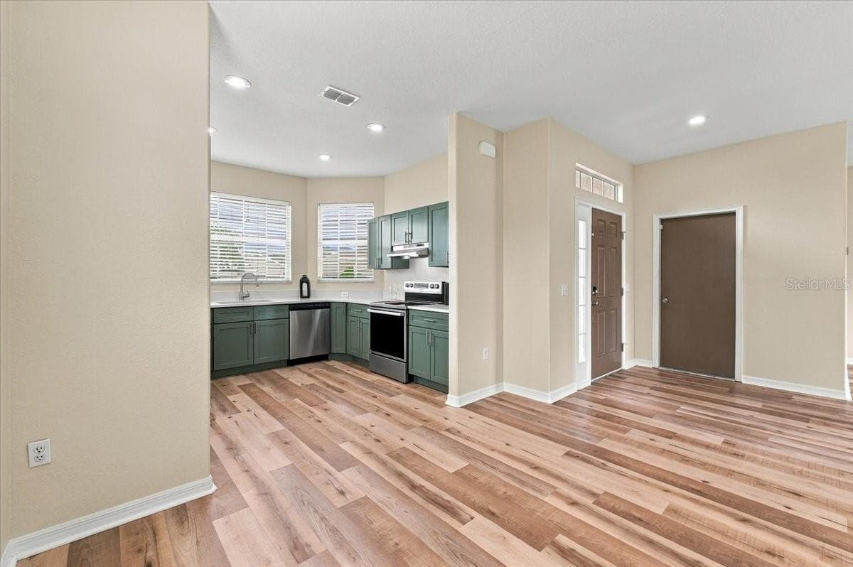 Standing in the Dining Room - 5014 YELLOWTOP LOOP, LAKELAND