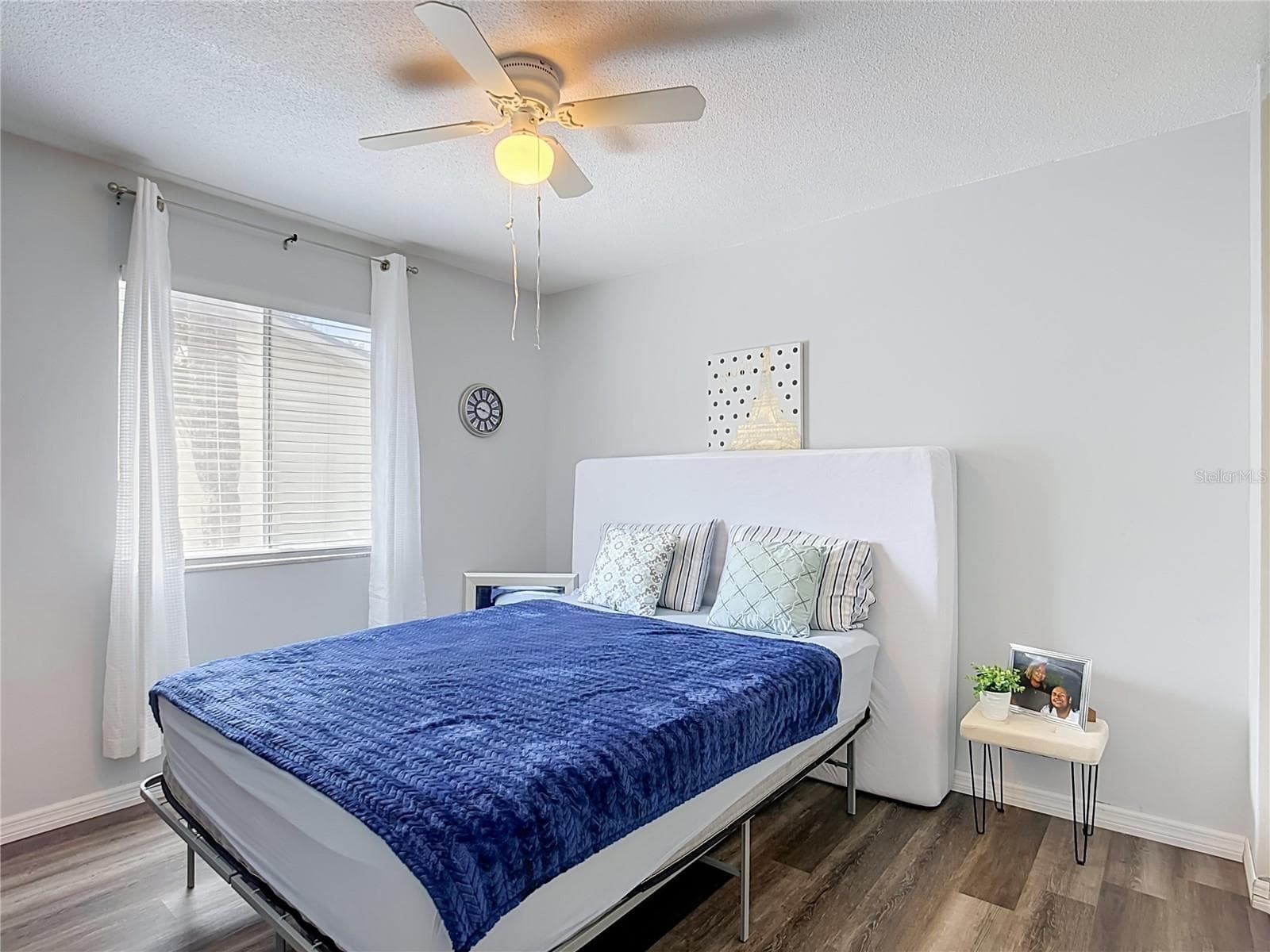 Bright bedroom with ceiling fan. - 1106 SPRING MEADOW DR, KISSIMMEE