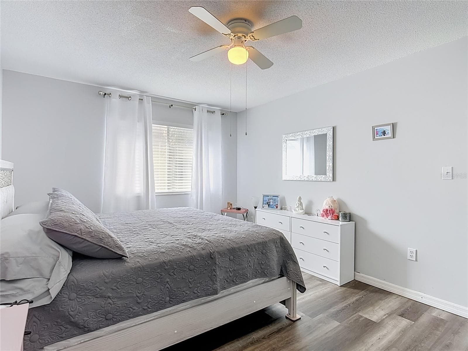 Inviting bedroom with natural light. - 1106 SPRING MEADOW DR, KISSIMMEE