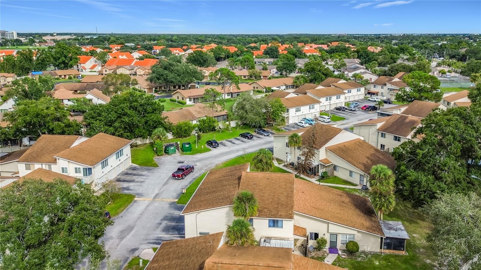 Community streets and green spaces. - 1106 SPRING MEADOW DR, KISSIMMEE