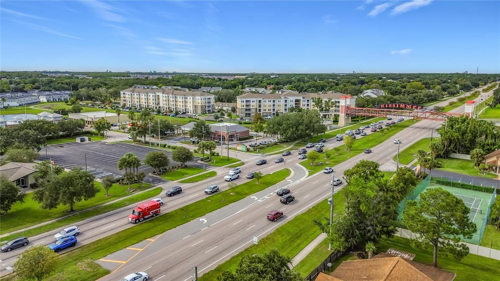 Main roadway and surrounding development. - 1106 SPRING MEADOW DR, KISSIMMEE