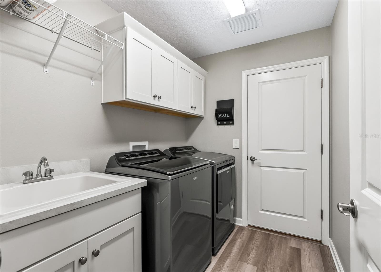 Laundry Room off Kitchen - 621 CHERRY CREEK WAY, THE VILLAGES