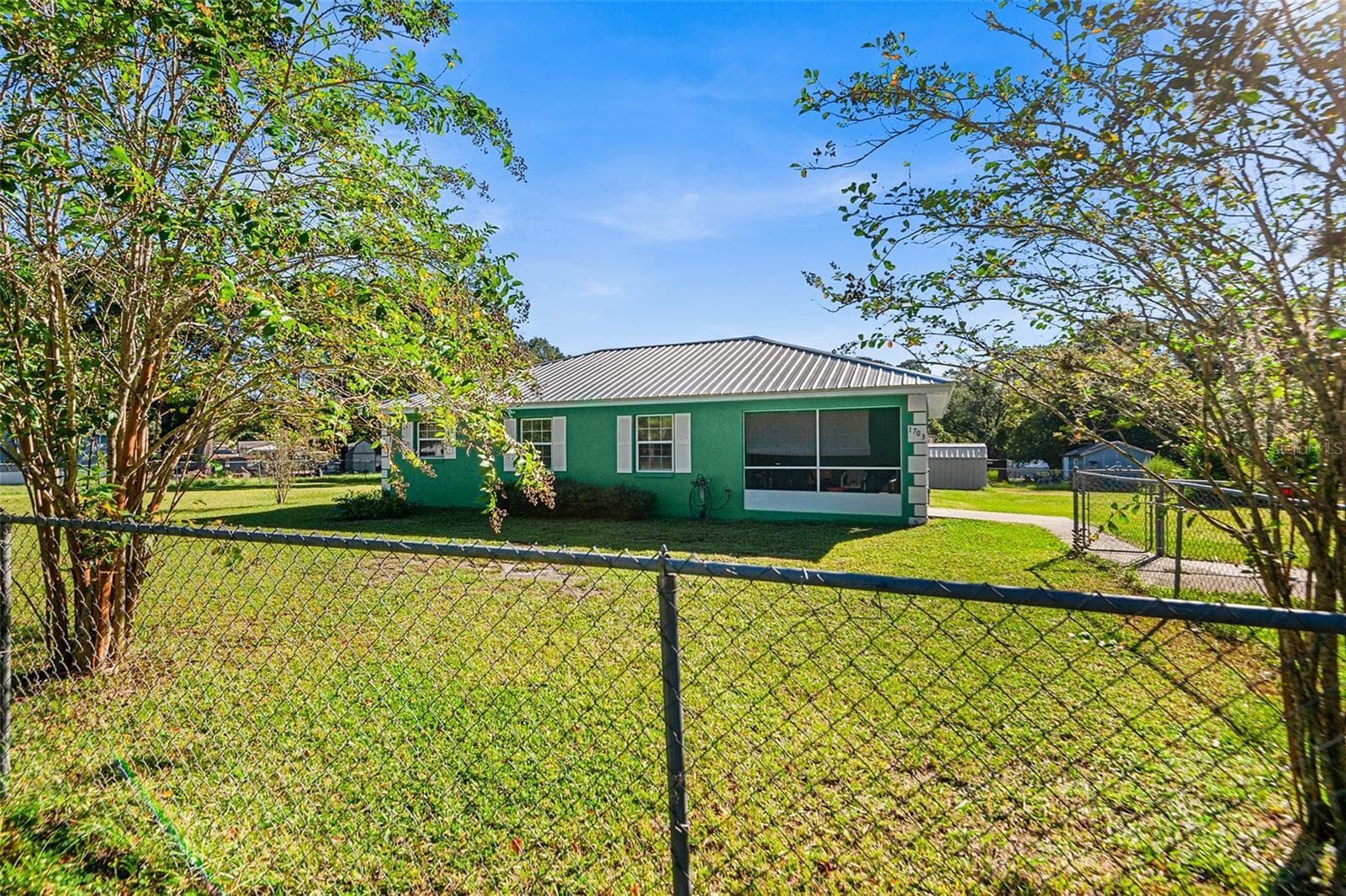 TOTAL LIVING AREA IS 1,133 - 1703 OAKLAND RD W, LAKELAND
