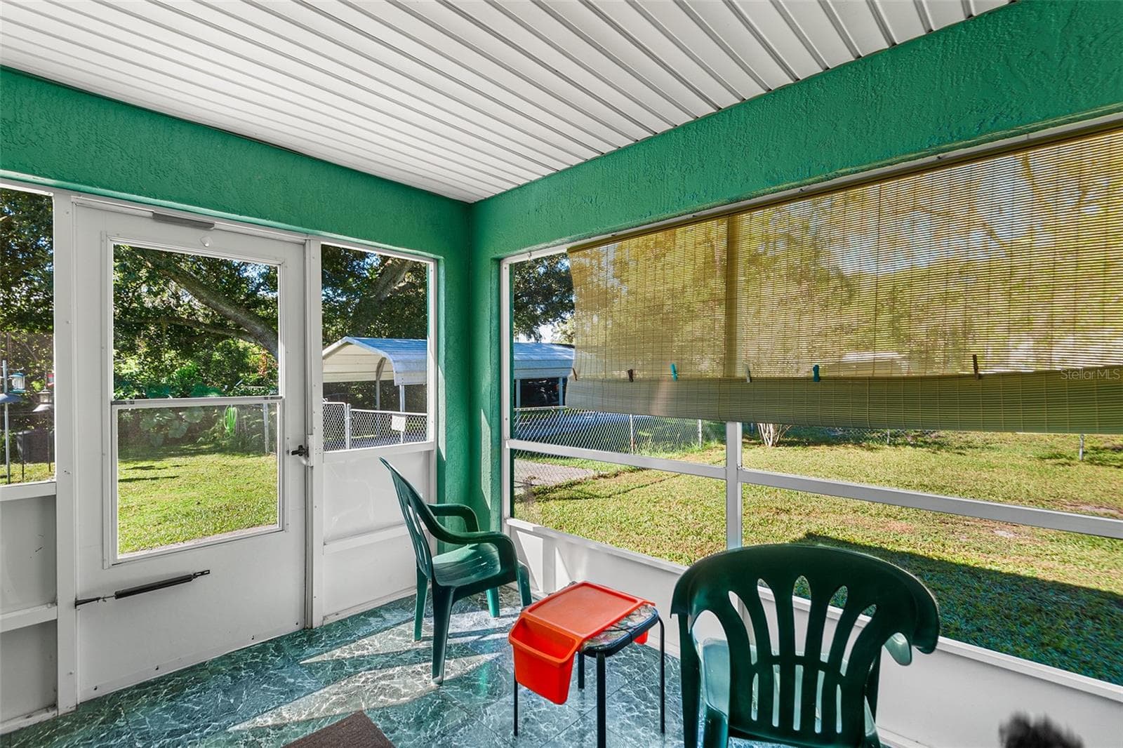 SCREENED FRONT PORCH AND MAIN ENTRY - 1703 OAKLAND RD W, LAKELAND