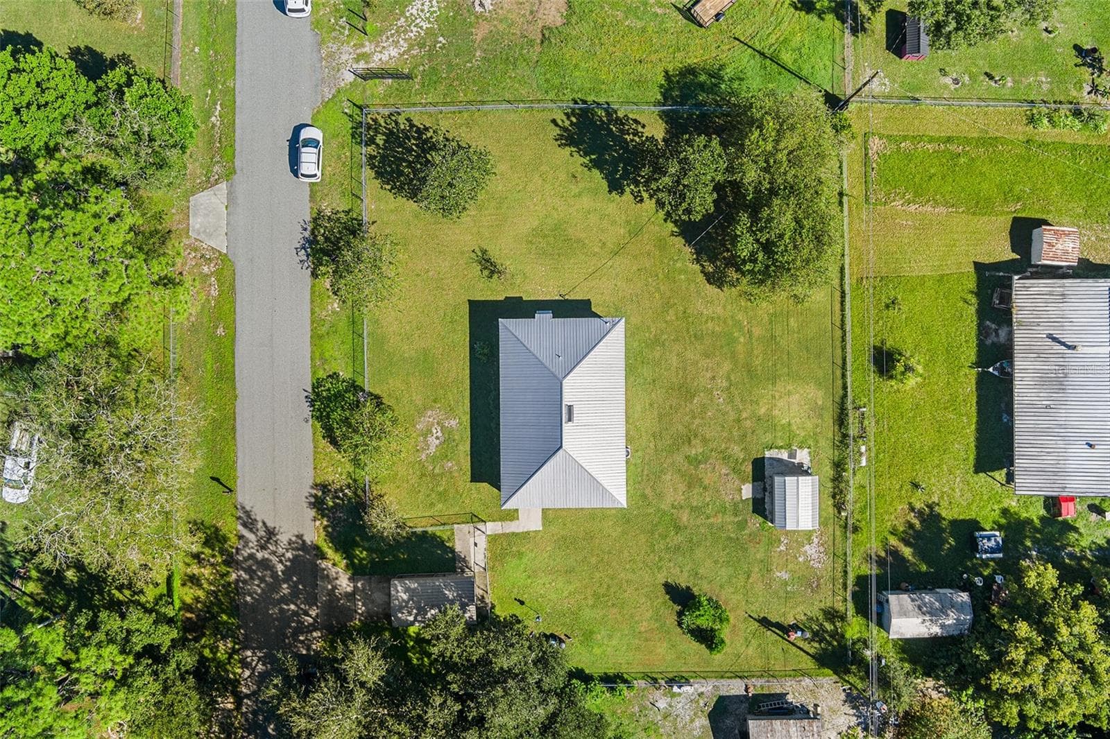 AERIAL VIEW 0.43 CLEARED ACRES FULLY FENCED - 1703 OAKLAND RD W, LAKELAND