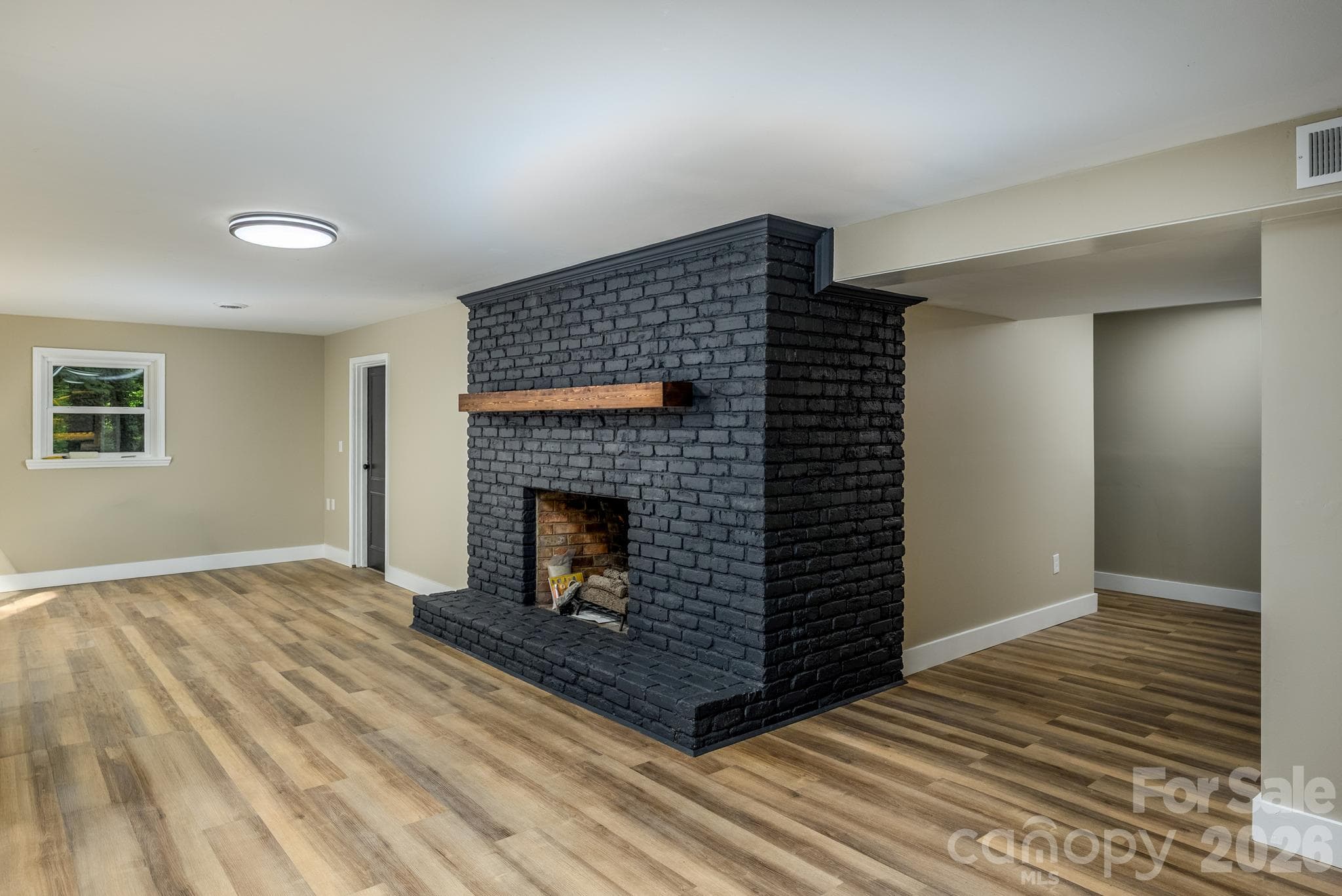 rec room with gas FP - 508 Berkshire Drive, Statesville