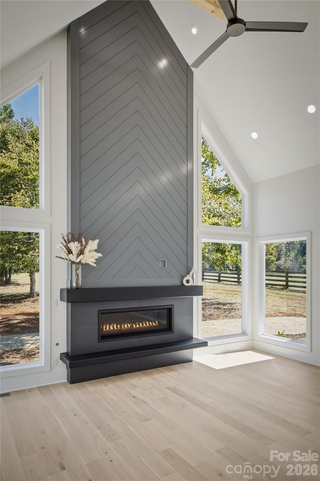 The engineered French oak hardwood flooring is gorgeous! These hardwoods are used throughout the home. There is NO carpet in the home at all! - 2303 Paddock Circle, Morganton