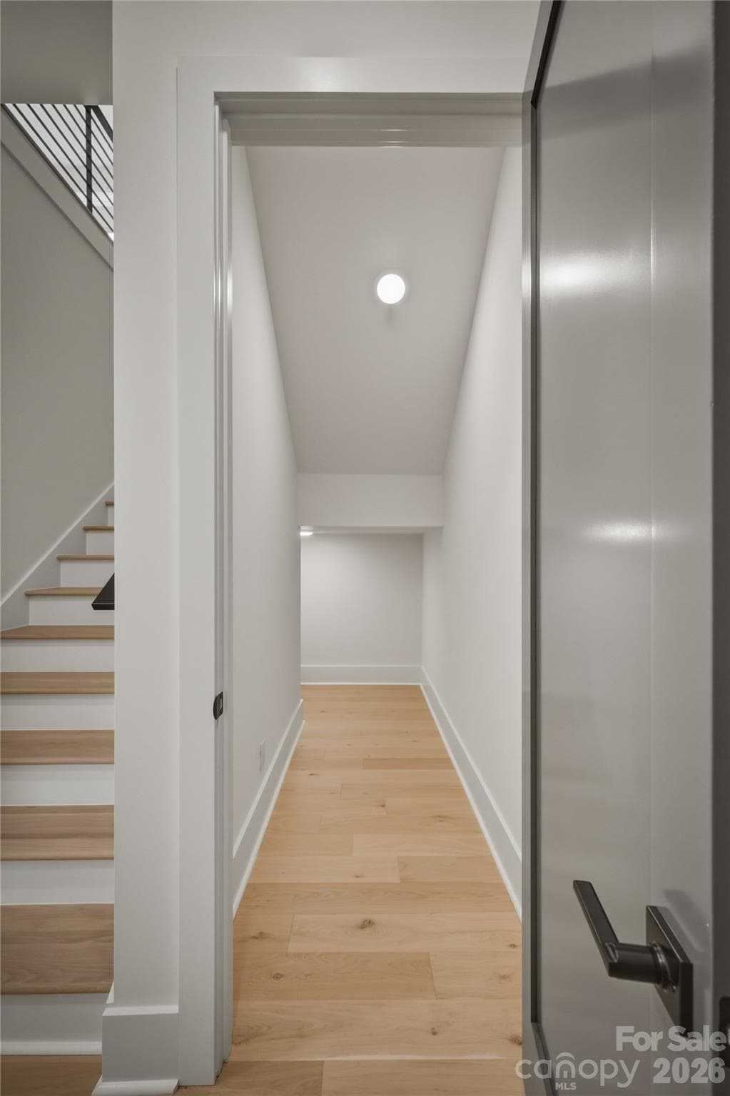Before heading upstairs, take a peek into the very large  and deep closet for tons of surprise storage. - 2303 Paddock Circle, Morganton