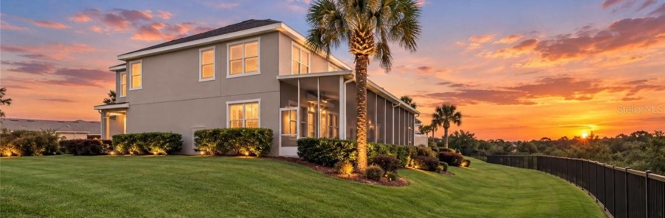 BACKYARD VIEW WITH FULL LANAI - 740 CHACALL LOOP, MOUNT DORA