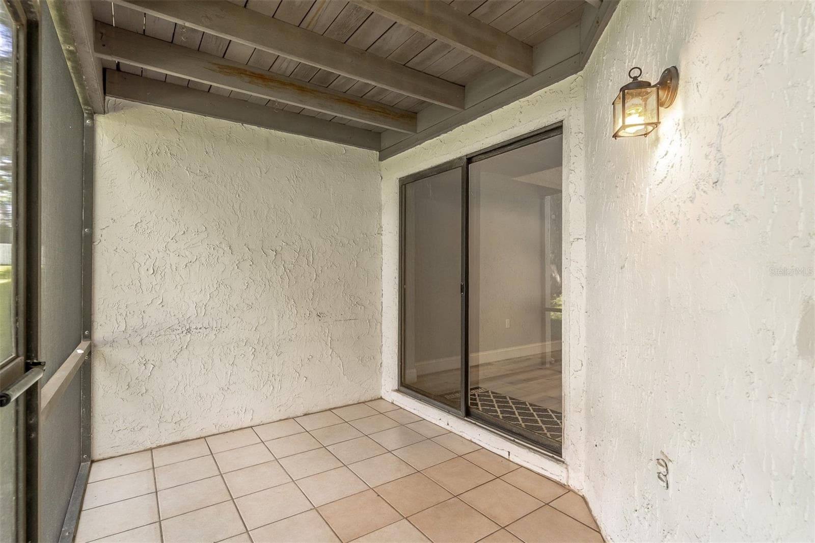 Access the screened-in rear patio from the dining room - 139 OLIVE TREE CIR, ALTAMONTE SPRINGS