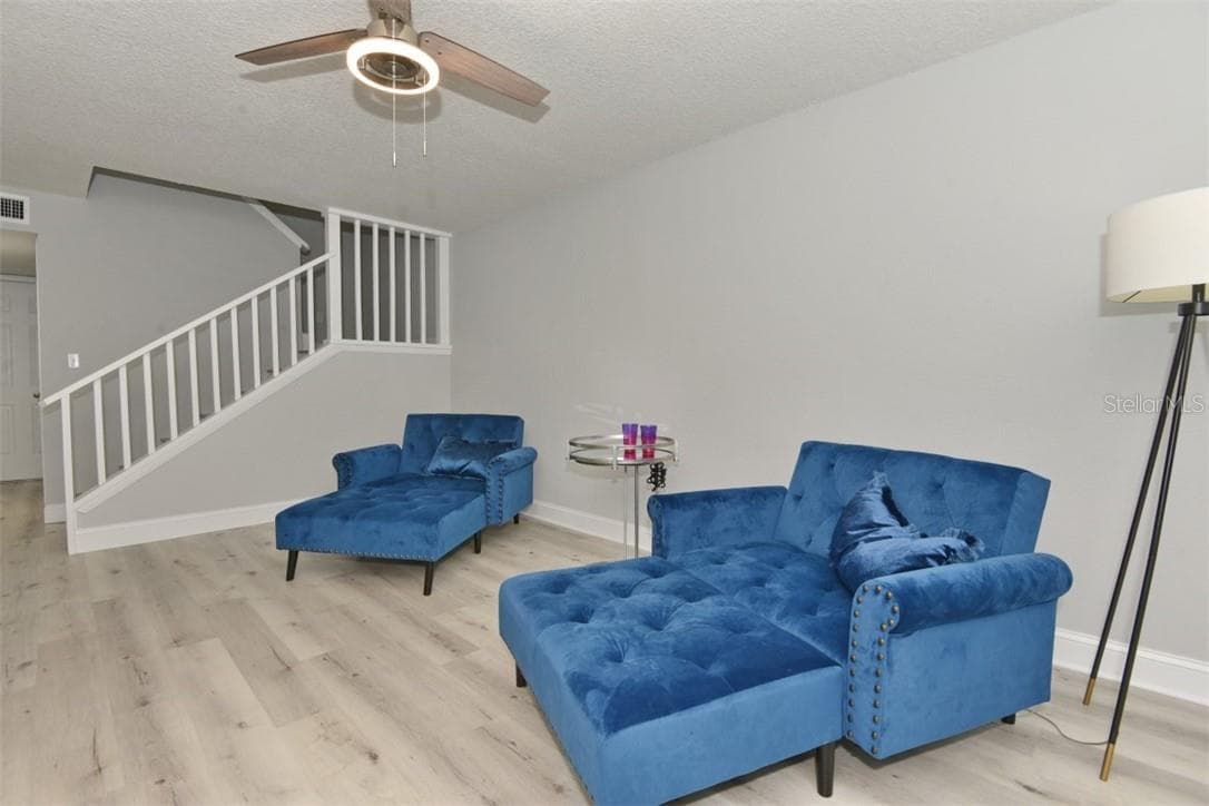 Spacious living room is 18.8 x 12.4. YOU, RIGHT HERE - 139 OLIVE TREE CIR, ALTAMONTE SPRINGS