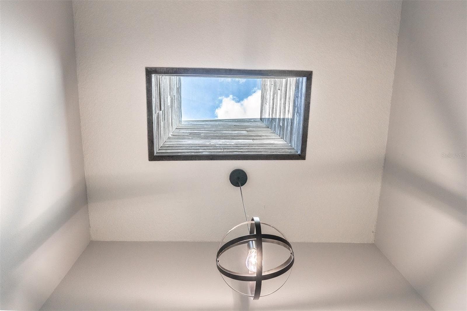Stairway Skylight with the same accent wood used througout. - 139 OLIVE TREE CIR, ALTAMONTE SPRINGS