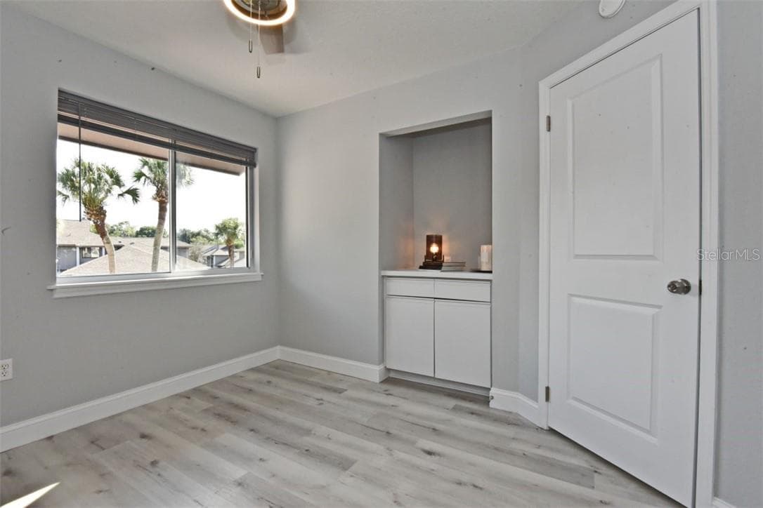Bedroom #2 (11x11). All interior doors have been replaced with new modern two panel doors with new hinges and brushed nickel door handles. - 139 OLIVE TREE CIR, ALTAMONTE SPRINGS