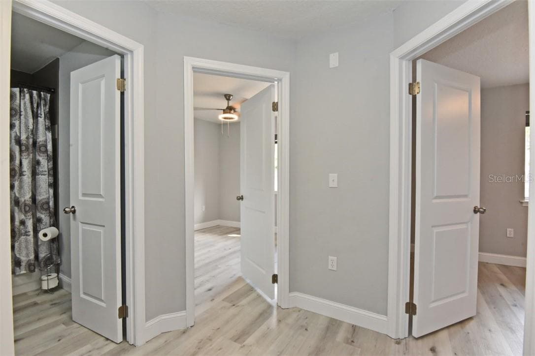 Upstairs loft leading to 2 front facing bedrooms, full bathroom with tub/shower combo, linen closet and the master suite facing to the back - 139 OLIVE TREE CIR, ALTAMONTE SPRINGS