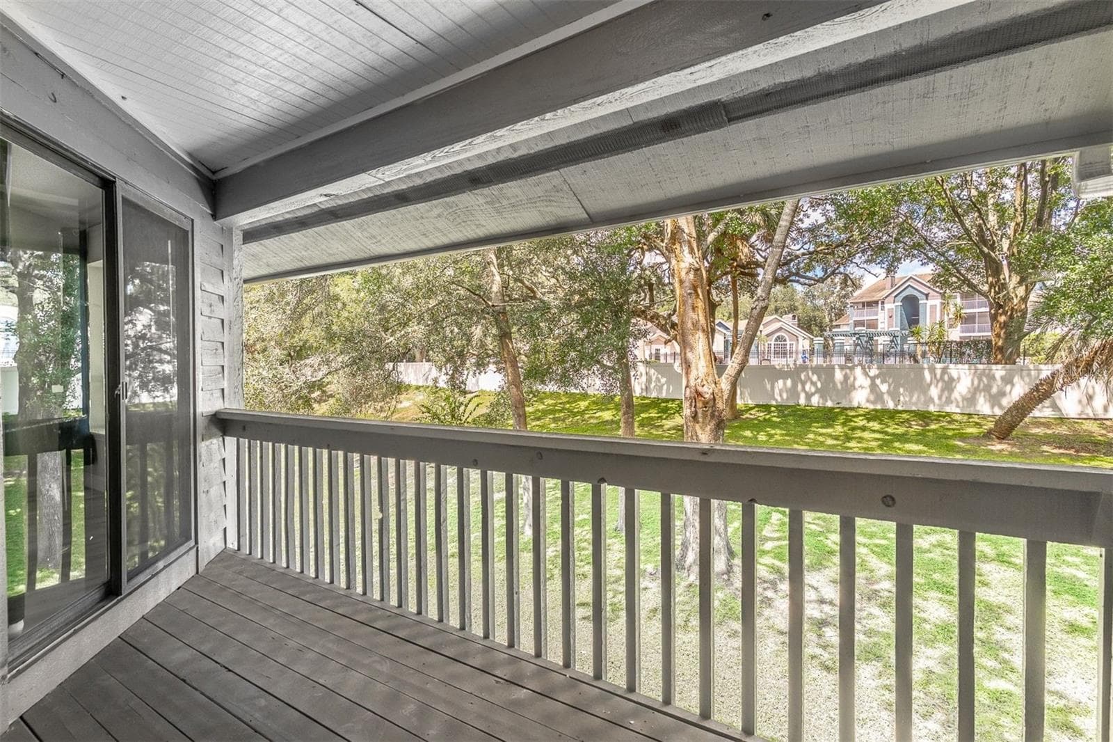MORNING COFFEE/TEE, ELEVATED. Step right out from the primary bedroom to your private balcony overlooking the greenbelt. - 139 OLIVE TREE CIR, ALTAMONTE SPRINGS