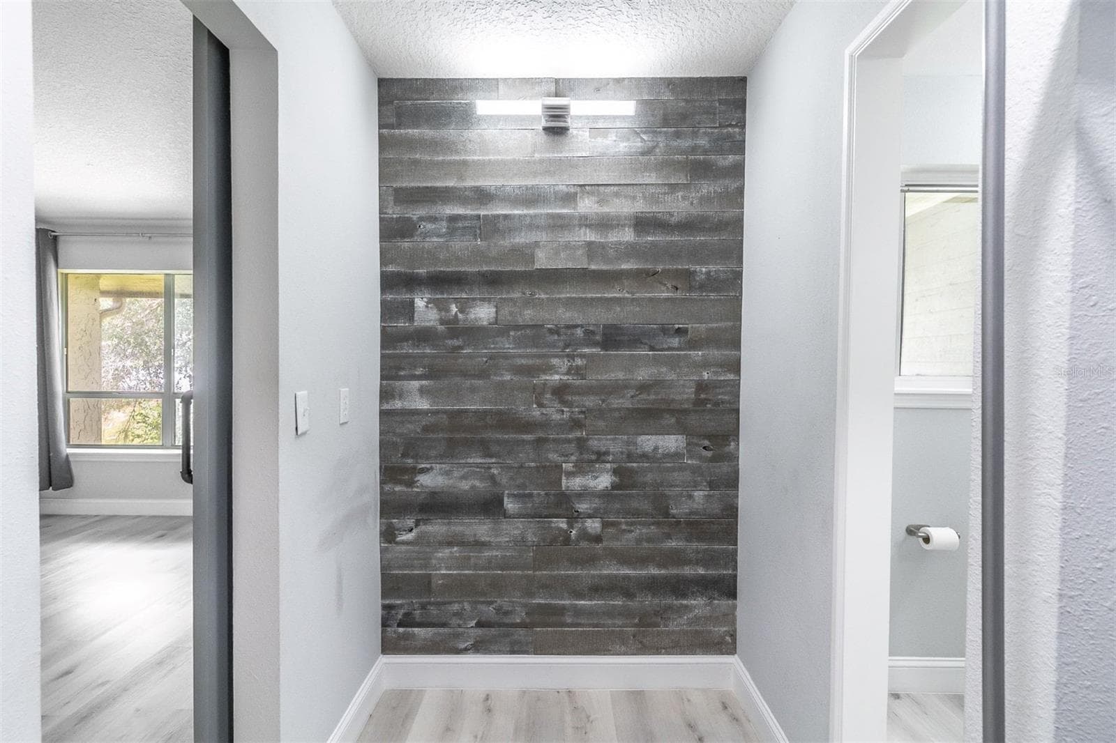 A thoughtfully designed ensuite featuring a dedicated dressing area, spa-like finishes, and a spacious walk-in closet. - 139 OLIVE TREE CIR, ALTAMONTE SPRINGS