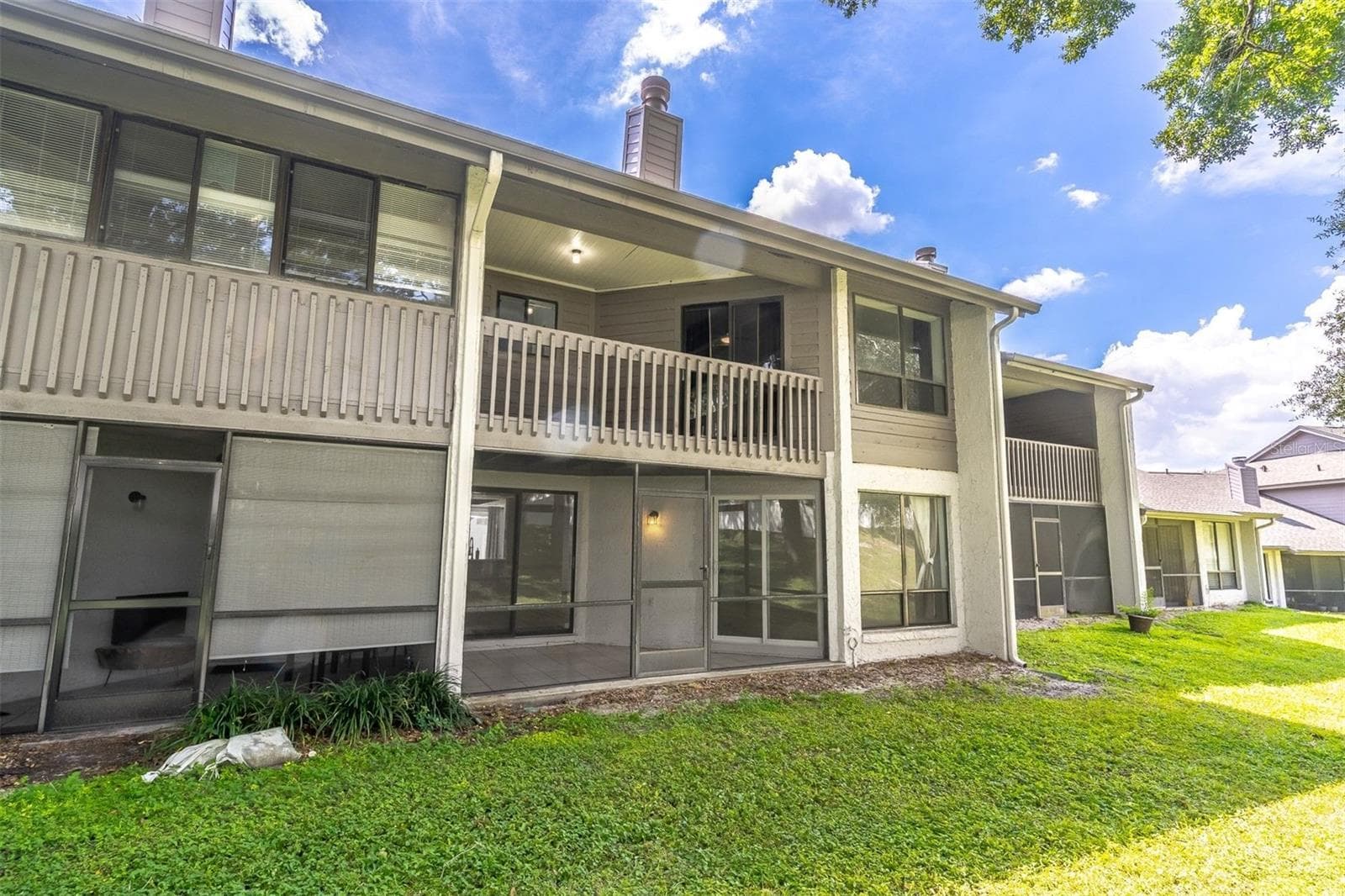 TWO LEVELS OF OUTDOOR ENJOYMENT - 139 OLIVE TREE CIR, ALTAMONTE SPRINGS