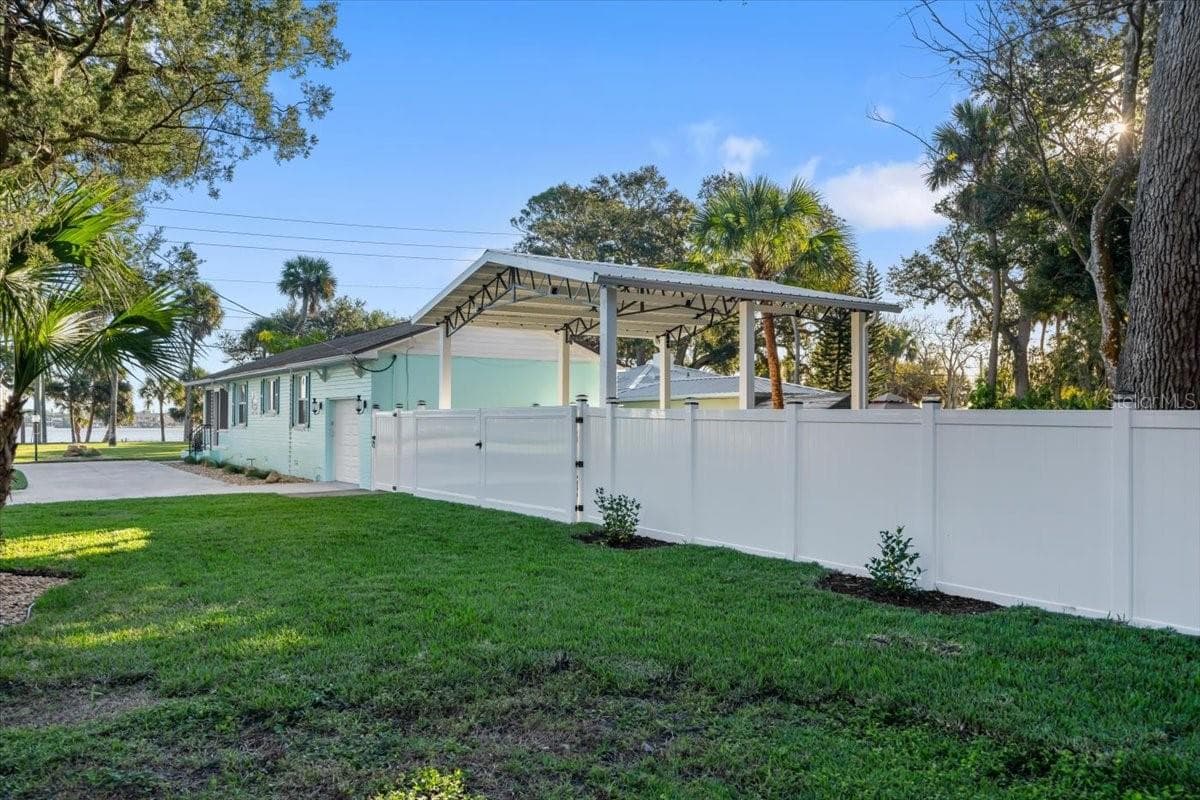 Extra lot area in rear with covered RV/Boat parking - 1146 RIVERSIDE DR, DAYTONA BEACH