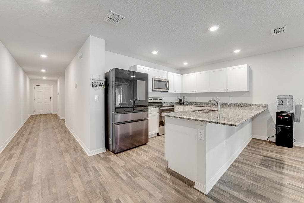 Single Family Residence at 8 PLUMTREE PL, PALM COAST, photo 11 of 37
