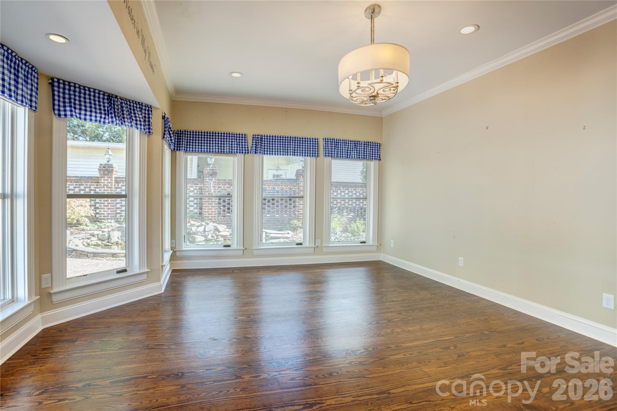 Bright sunroom with a mini split for added comfort - 30 Georgia Street NW, Concord