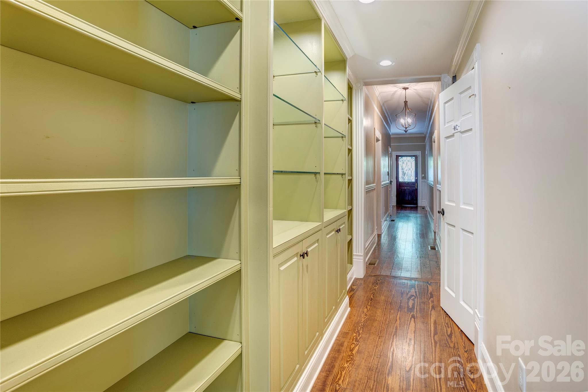 Built in cabinets and shelving in hallway - 30 Georgia Street NW, Concord