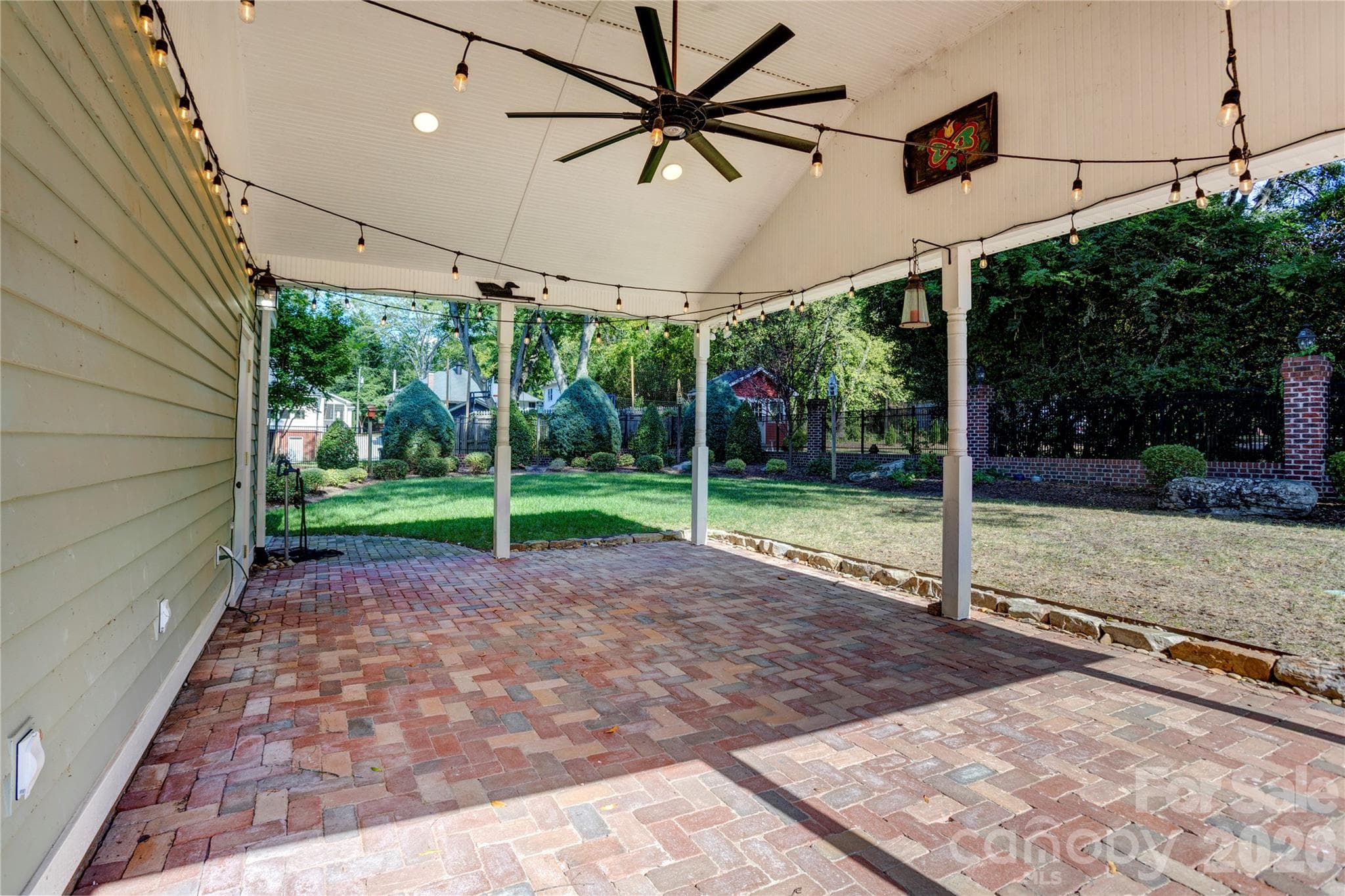 Entertaining outdoor living pavilion with room for outdoor kitchen, TV, and cozy furniture - 30 Georgia Street NW, Concord