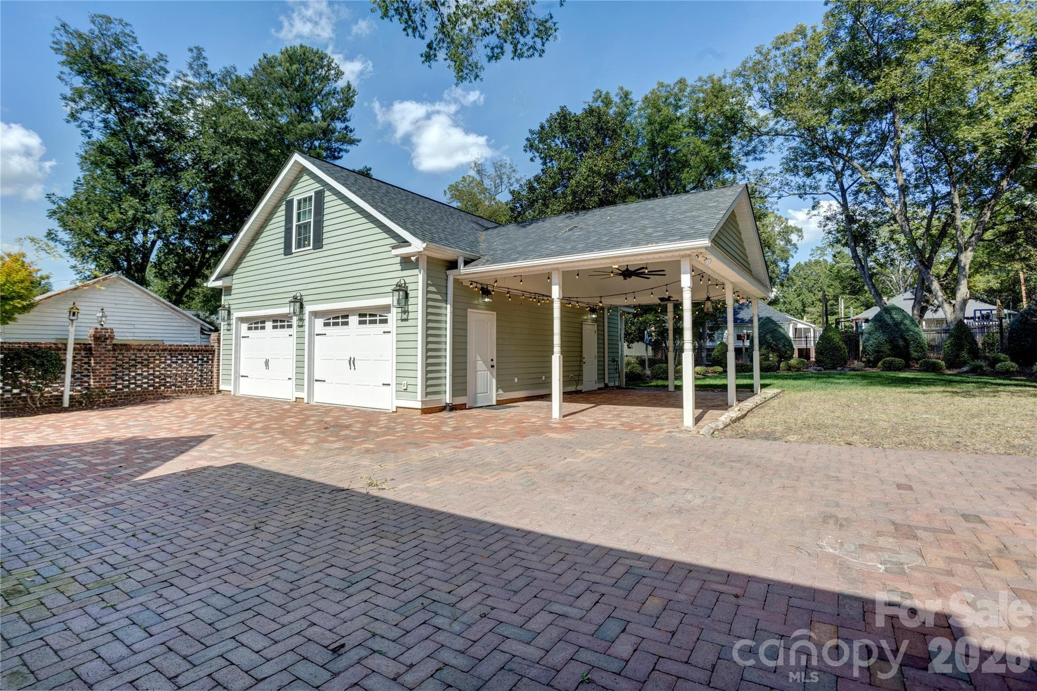 2 car detached garage with storage space above and an outdoor living pavilion - 30 Georgia Street NW, Concord