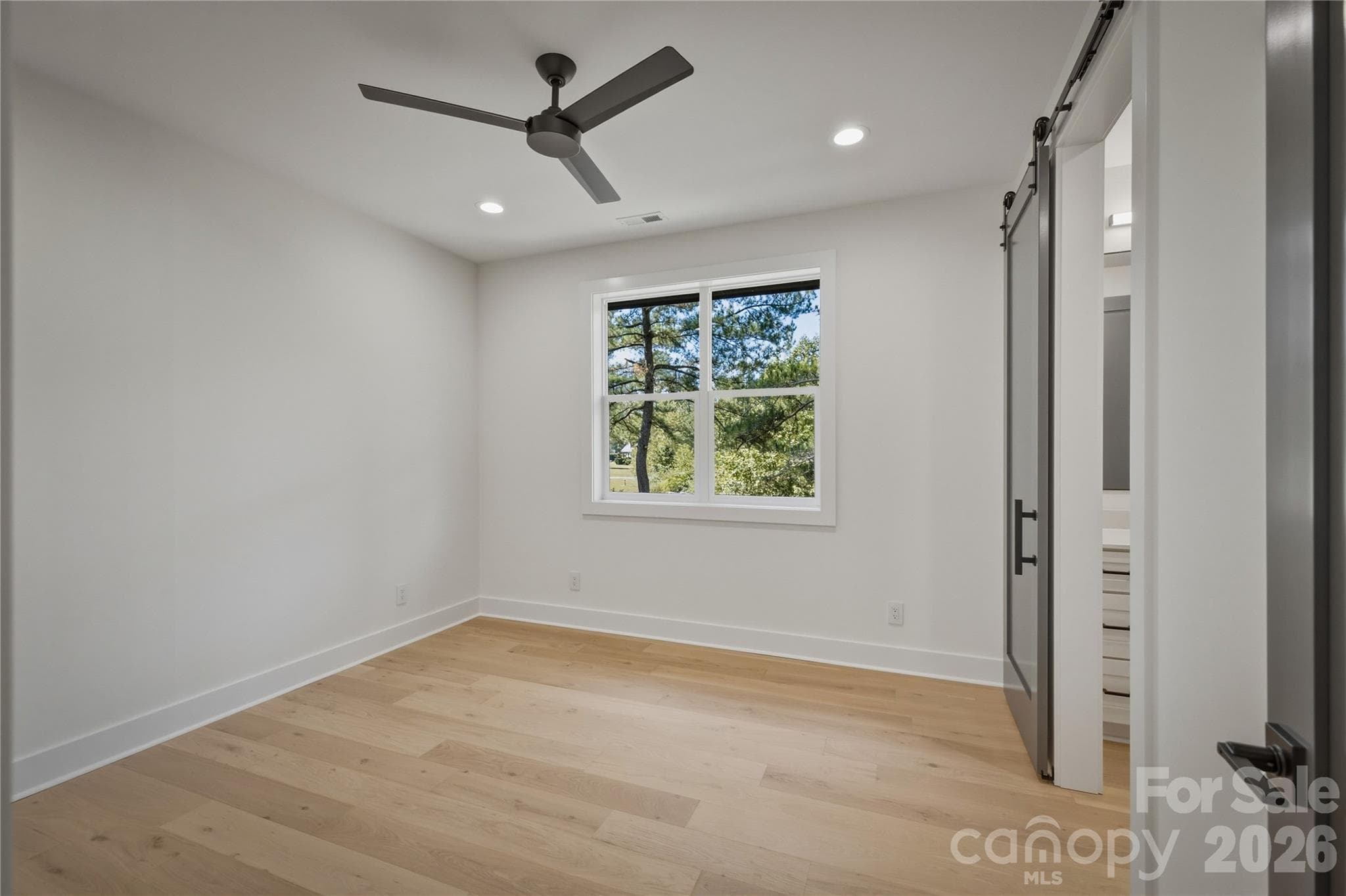 Let's check out the upstairs bedrooms. We will start with Suite #2. - 2303 Paddock Circle, Morganton