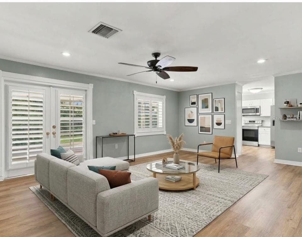 Living Rm / AI Staged - 11626 CARROLLWOOD DR, TAMPA