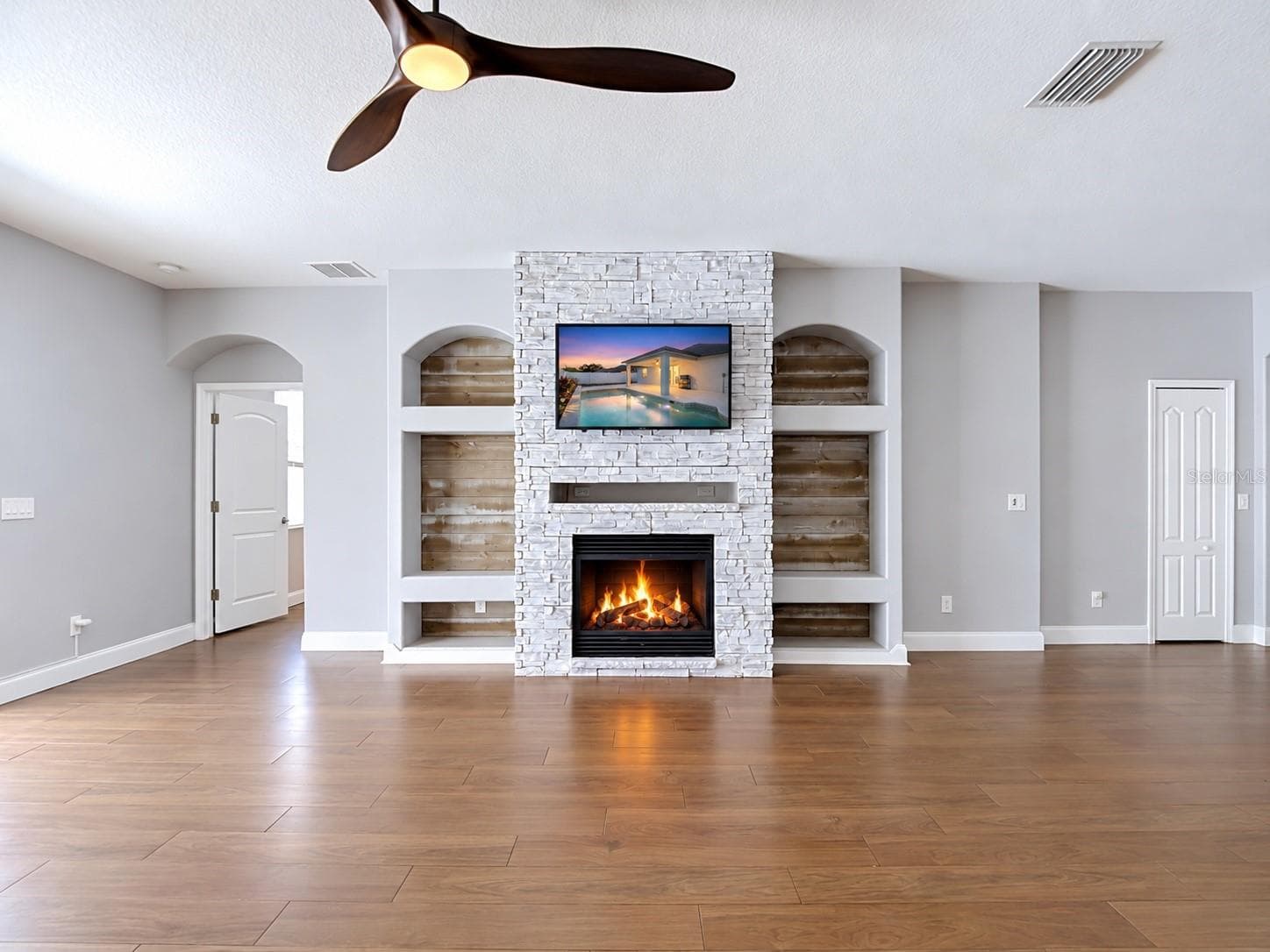 Family Room with Gas Fireplace - 18316 CYPRESS HAVEN DR, TAMPA