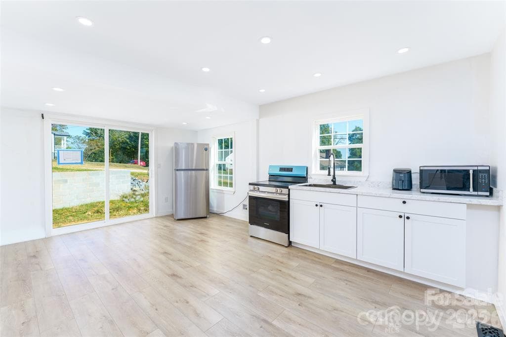 Single Family Residence at 640 Mckee Street, Albemarle, photo 6 of 13