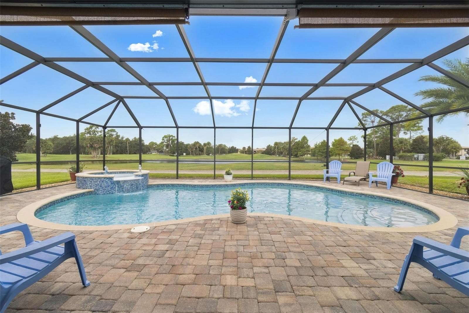 Saltwater heated pool with deck pavers and spa - 8 COUNTRY CLUB HARBOR CIR, PALM COAST