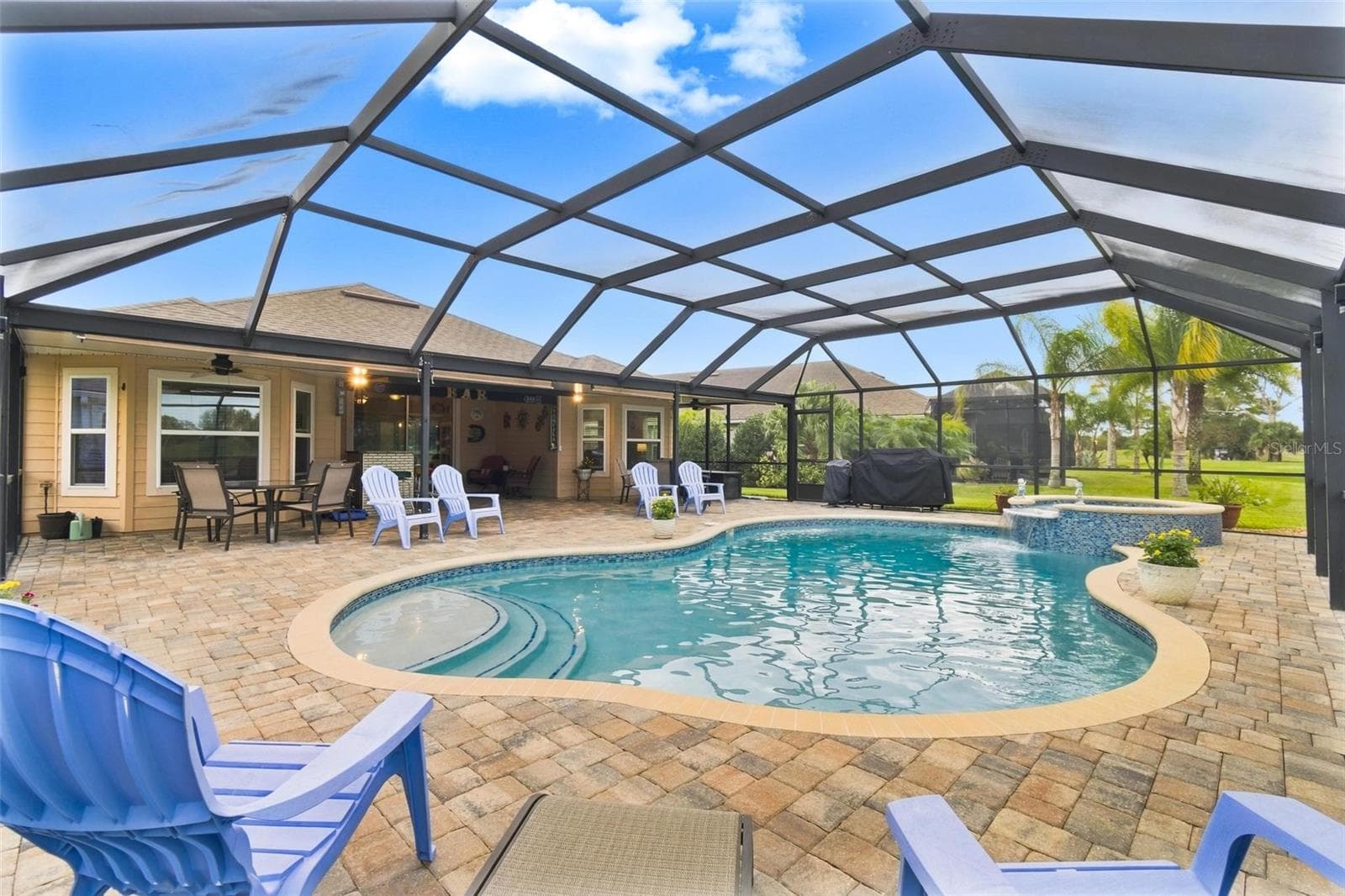 Saltwater heated pool with deck pavers - 8 COUNTRY CLUB HARBOR CIR, PALM COAST