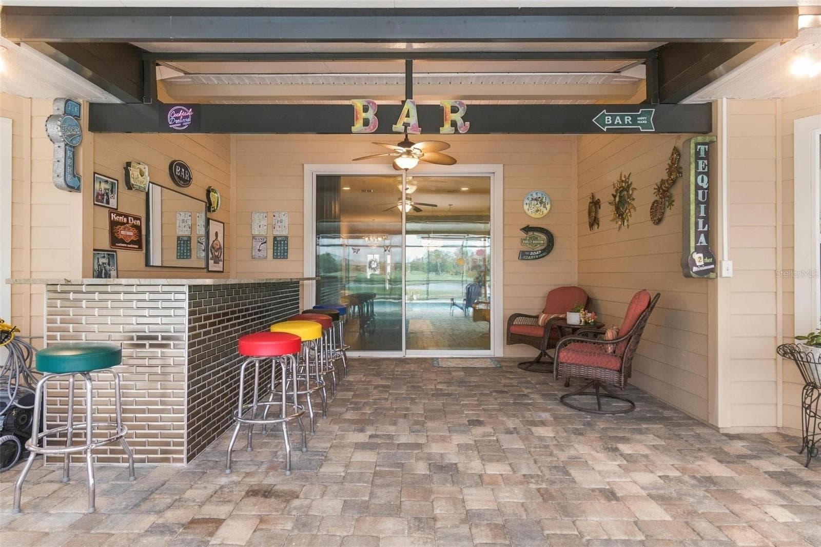 Covered area of lanai (22 X 40) with bar - 8 COUNTRY CLUB HARBOR CIR, PALM COAST