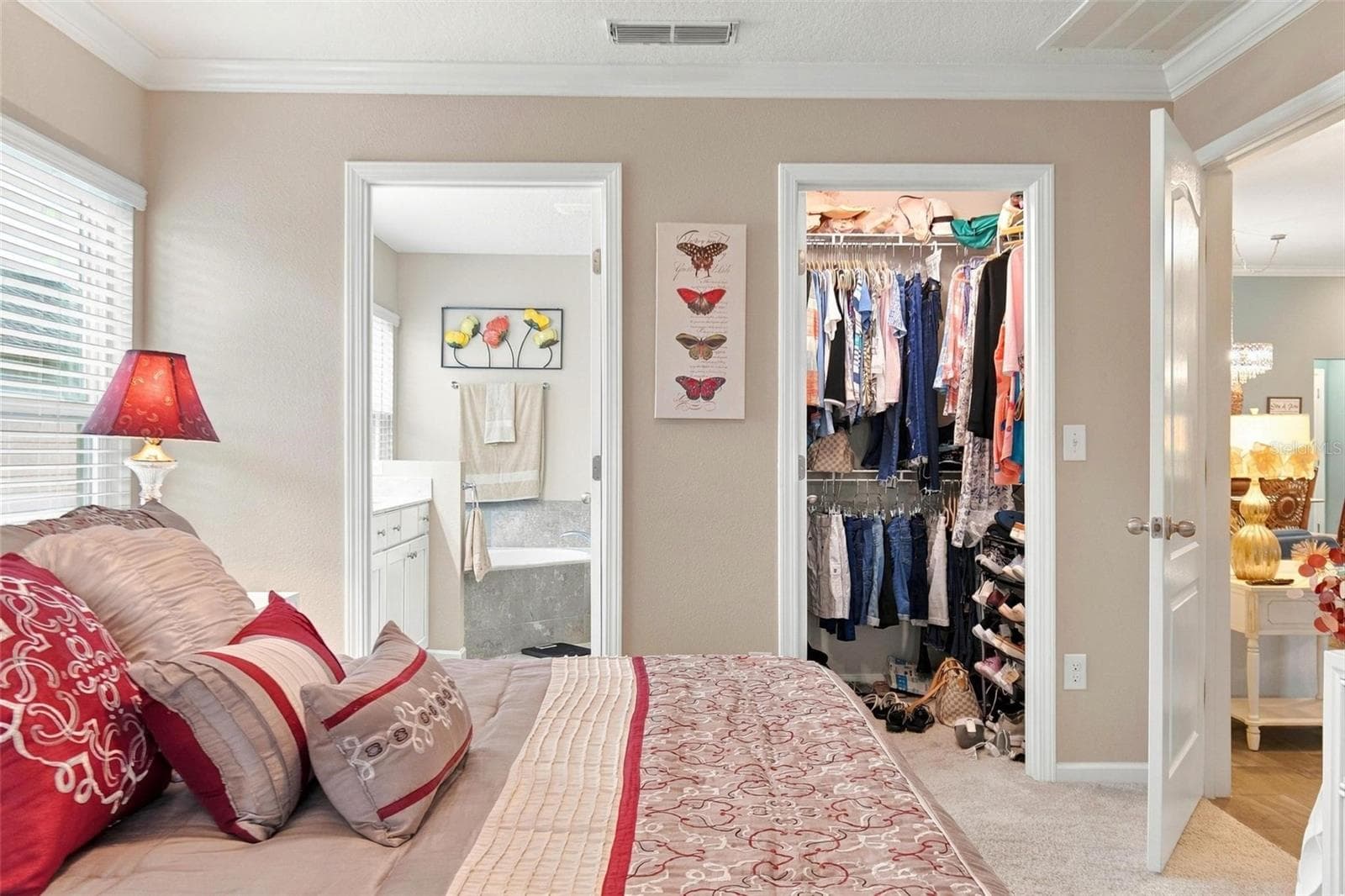 Primary bedroom 1 with walk in closet - 8 COUNTRY CLUB HARBOR CIR, PALM COAST