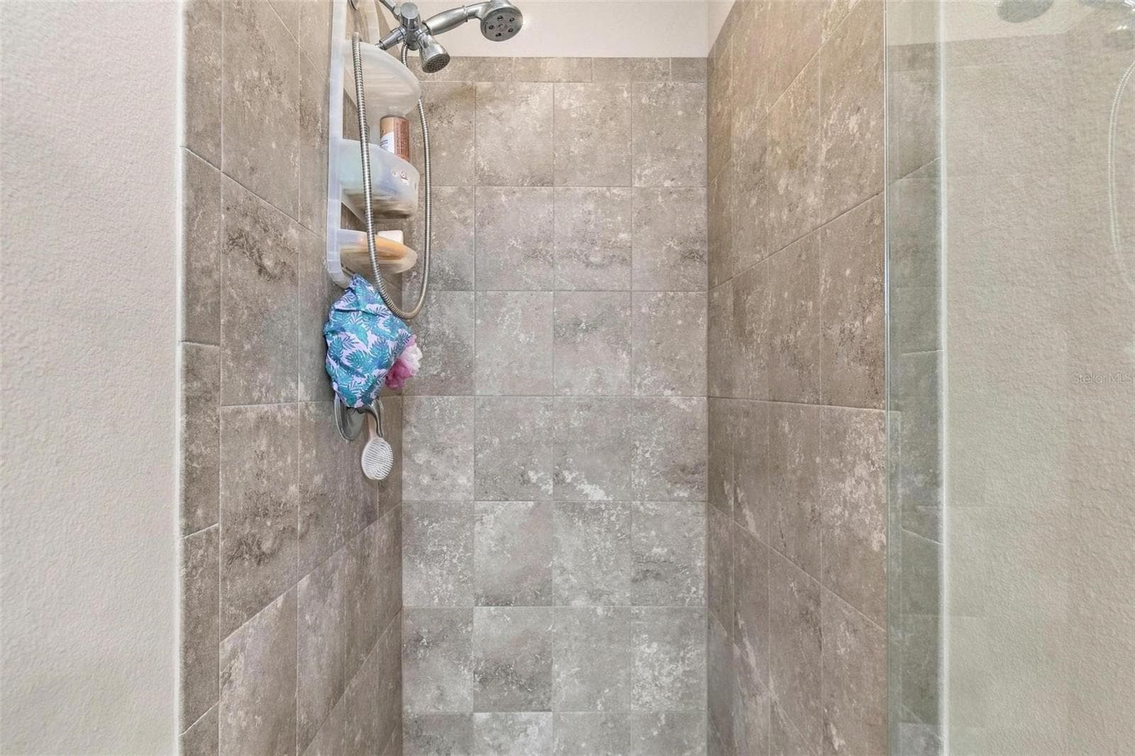 Tiled shower - 8 COUNTRY CLUB HARBOR CIR, PALM COAST