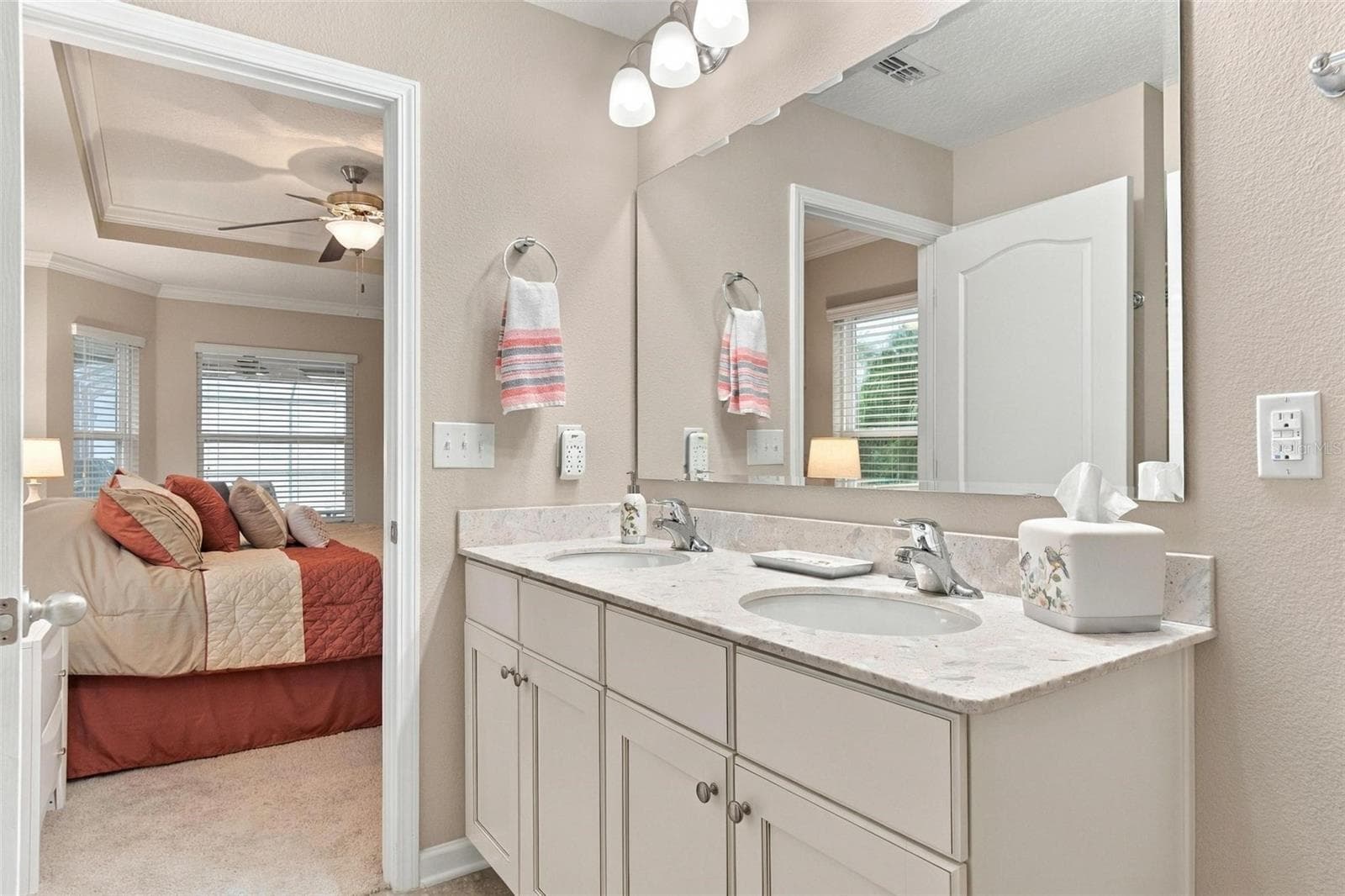 Primary bathroom 2 with dual sinks - 8 COUNTRY CLUB HARBOR CIR, PALM COAST