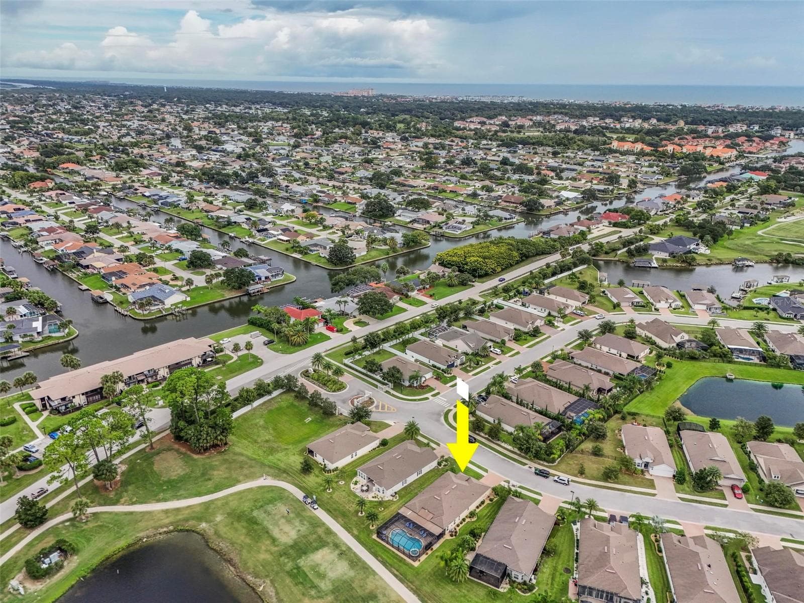 View north and east towards saltwater canals - 8 COUNTRY CLUB HARBOR CIR, PALM COAST