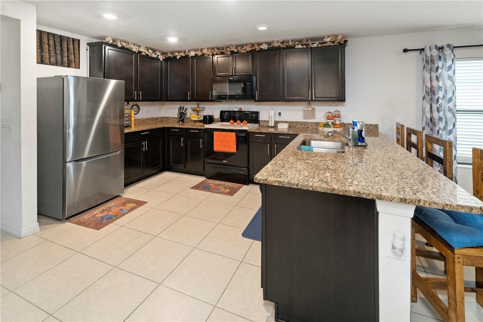 Large Open Kitchen with bar and seating - 1007 CULBREATH GREEN CT, RUSKIN