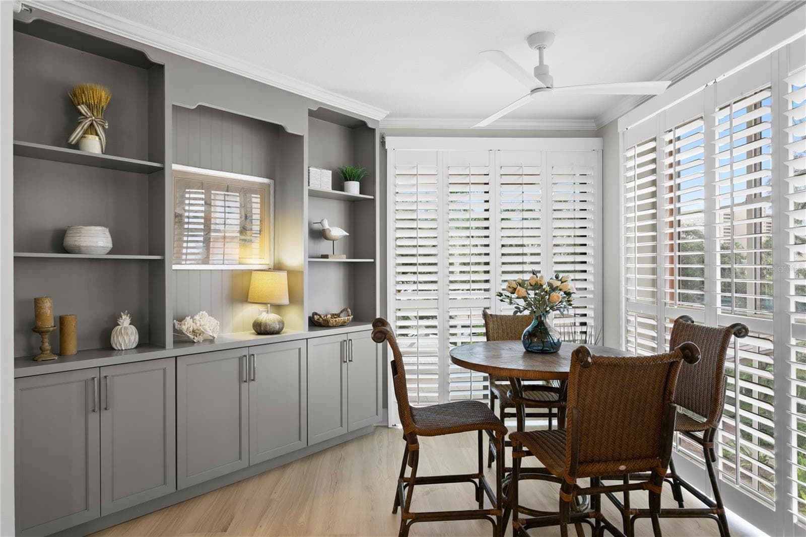 Casual Dining Area with Entertainment Center and Access to South Veranda - 4961 BACOPA LN S #201, ST PETERSBURG