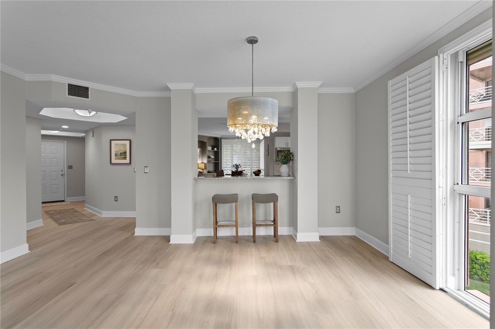 Dining Area Looking back towards Kitchen and Entry - 4961 BACOPA LN S #201, ST PETERSBURG
