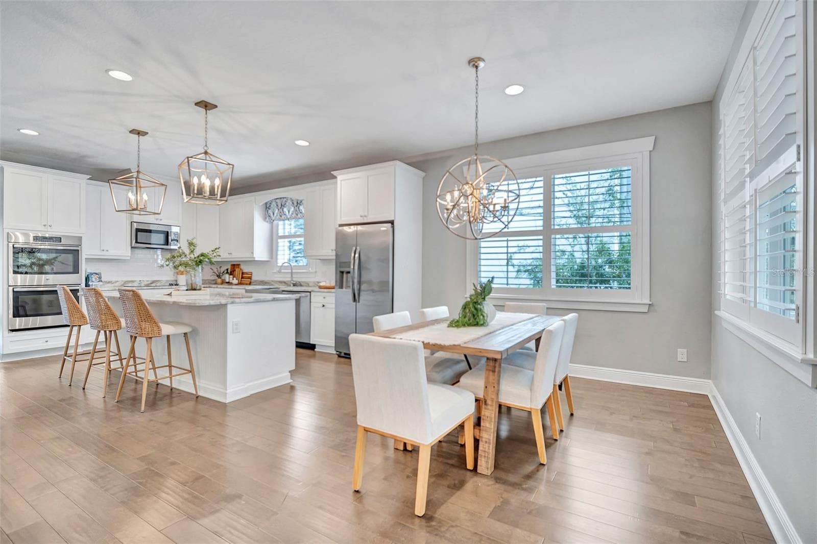 Dining/Kitchen Staged - 3615 W RENELLIE CIR, TAMPA