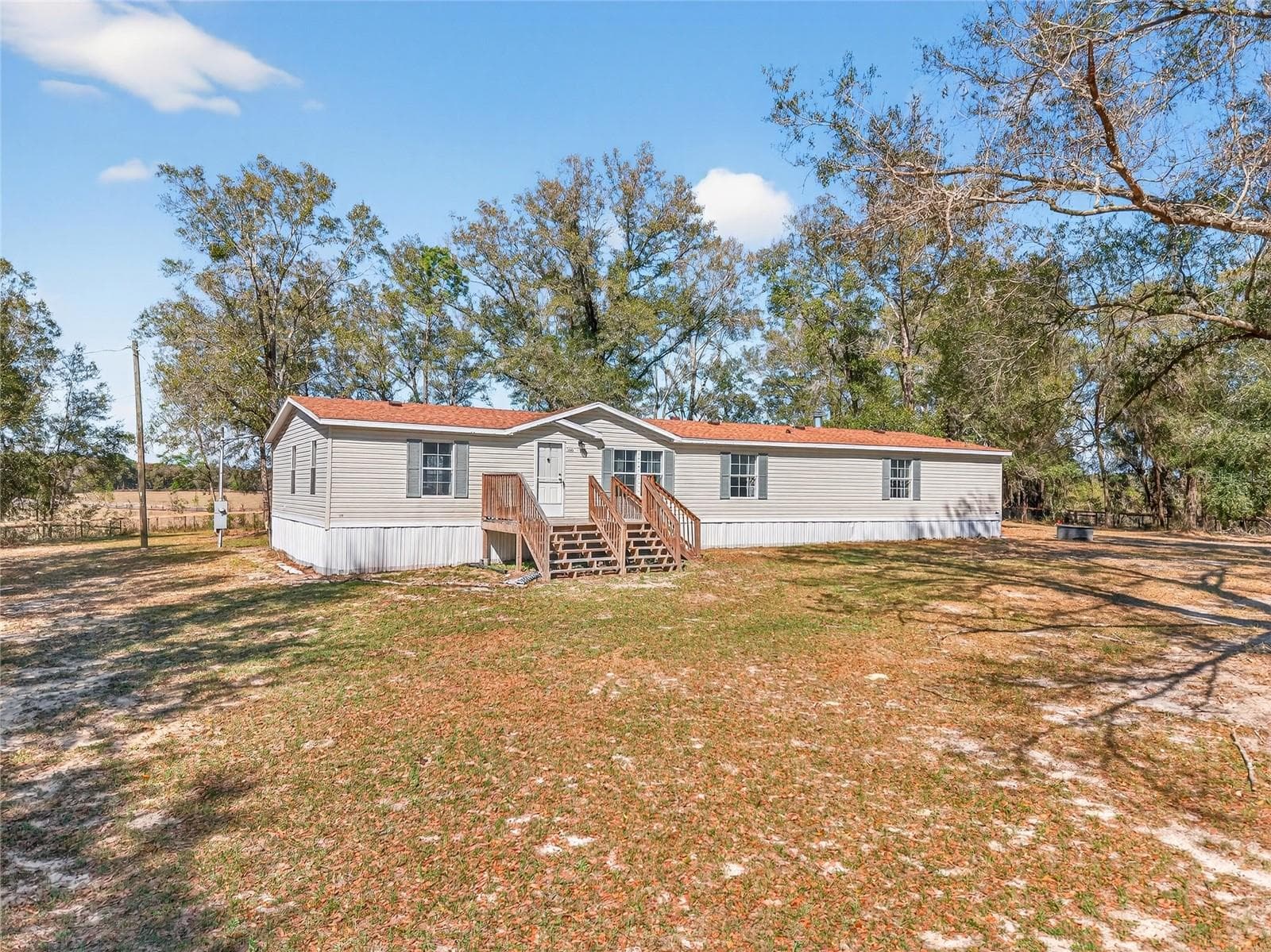Manufactured Home at 10427 NW 8TH LN, OCALA, photo 2 of 38
