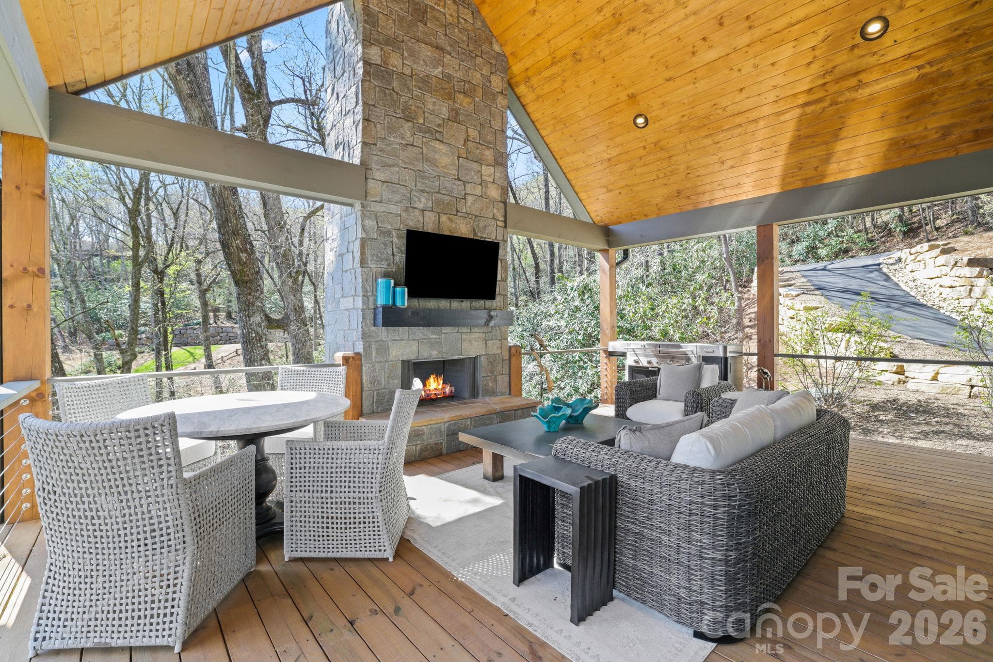 Main level oversized covered Porch with grilling station and wood burning or gas fireplace - 95 Cardinal Trace, Lake Toxaway
