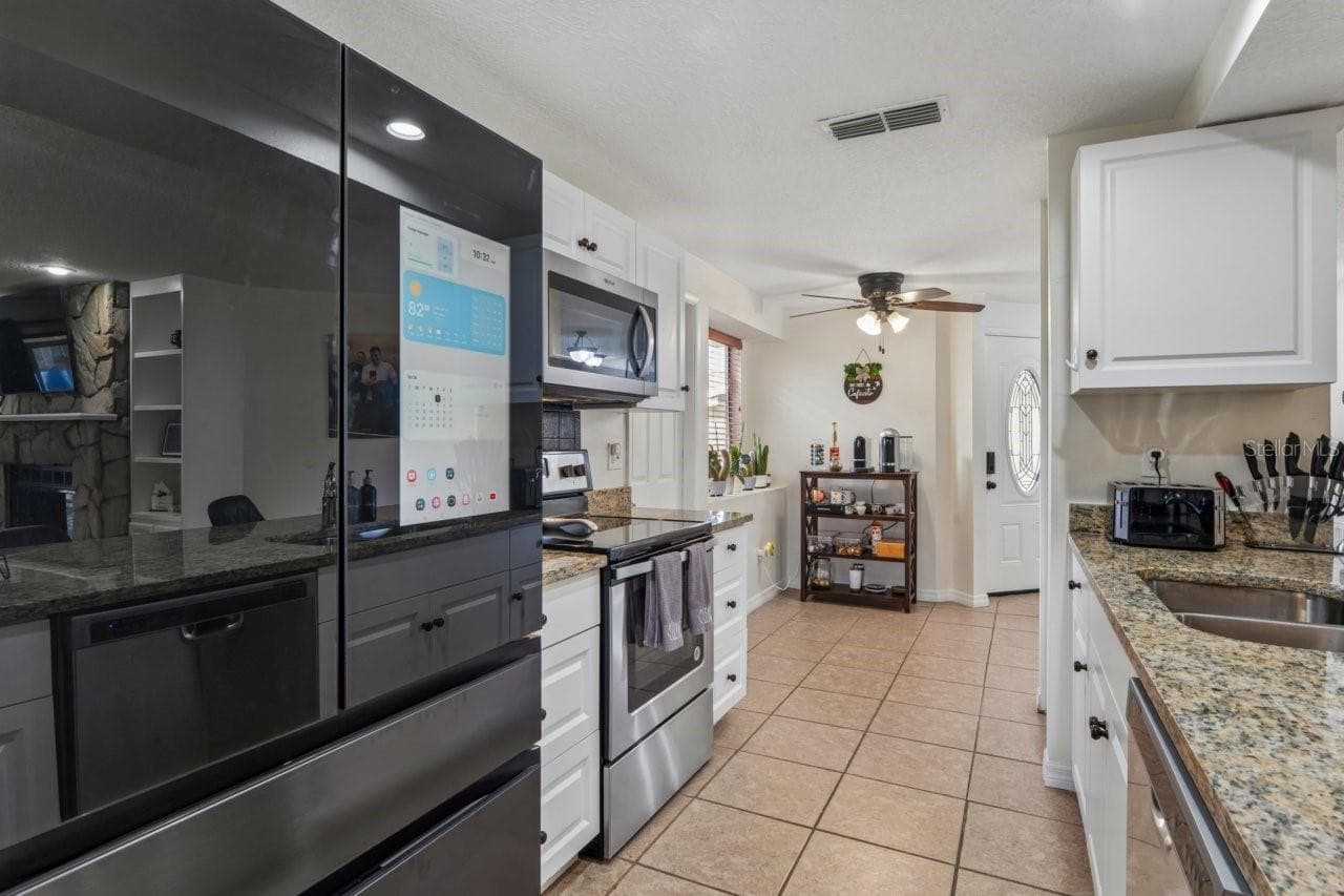 Single Family Residence at 583 LONGWOOD CT, OLDSMAR, photo 4 of 64